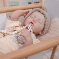 thumbnail image 4 of Disfraz Reborn Baby Doll Cloveray de 20 pulgadas para niña, color beige, 4 of 8