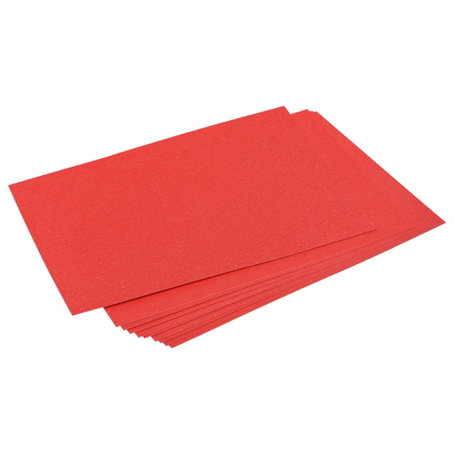 Unique Bargains Pearlescent Card Stock 25 Sheets, 8x11.5 Inch 92 Lb/250gsm, Red. A stack of double-sided shimmer cardstock paper in vibrant red with a subtle pearlescent finish. Each sheet measures 8 inches by 11.5 inches and is 0.3mm thick, offering a sturdy 92 lb/250gsm weight. Ideal for DIY crafts, including scrapbooking, card making, and decorative projects. The paper is easy to cut, fold, and punch, making it suitable for creating custom shapes and designs.