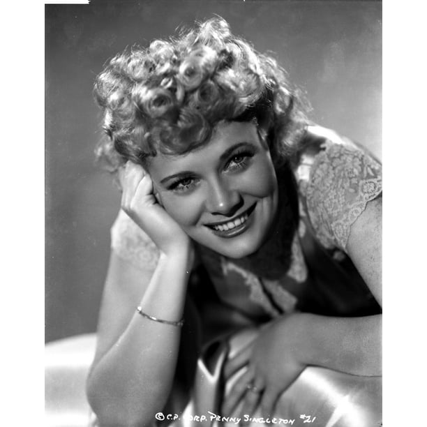 Penny Singleton smiling with One Hand on Face in Floral Dress Close Up ...