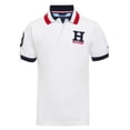 thumbnail image 1 of Polo Tommy Hilfiger de manga corta con estampado de hiedra elástica para niños, 1 of 3