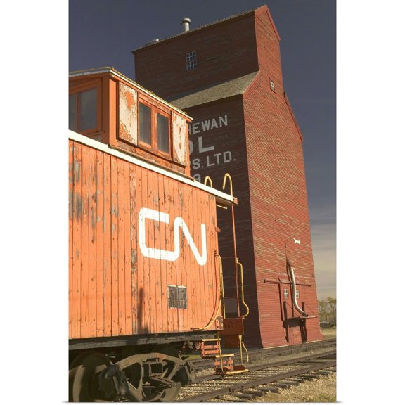Great BIG Canvas | Rolled Walter Bibikow Poster Print entitled Canada, Alberta, Historic Railway Locomotive and Grain Silo
