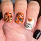 thumbnail image 1 of Uñas postizas acrílicas brillantes cortas con calavera cuadrada y telaraña para Halloween., 1 of 5