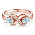 thumbnail image 2 of Gem Stone King 18K Rose Gold Plated Silver Sky Blue Topaz and Created Sapphire Infinity Love Knot Ring for Women | 1.11 Cttw | Oval 6X4MM | Gemstone Birthstone | Jewelry Gifts for Mom Wife | Size 5, 2 of 5