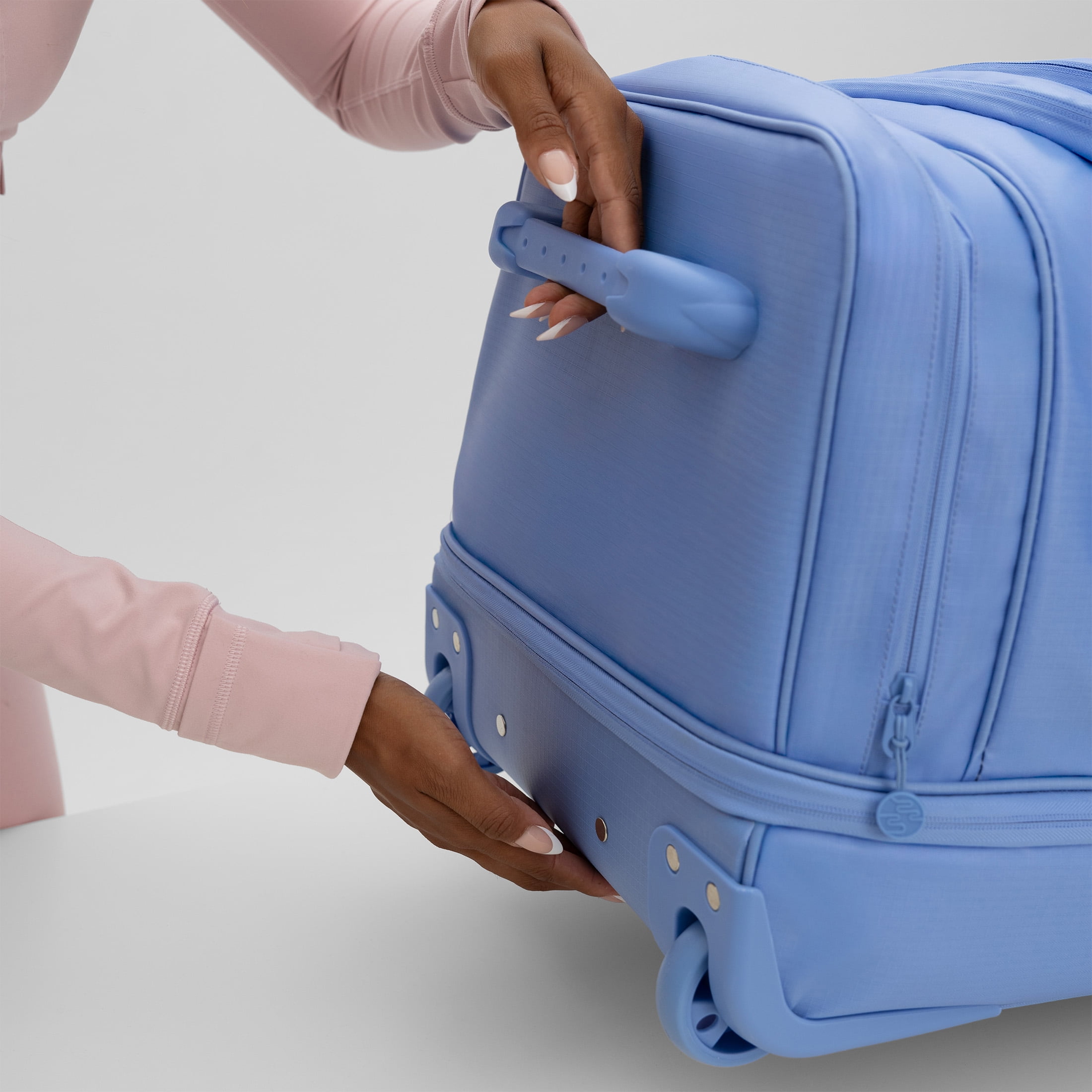 iFLY 30" Drop-Bottom Rolling Duffel – Large Travel Bag with Wheels, Frost Blue