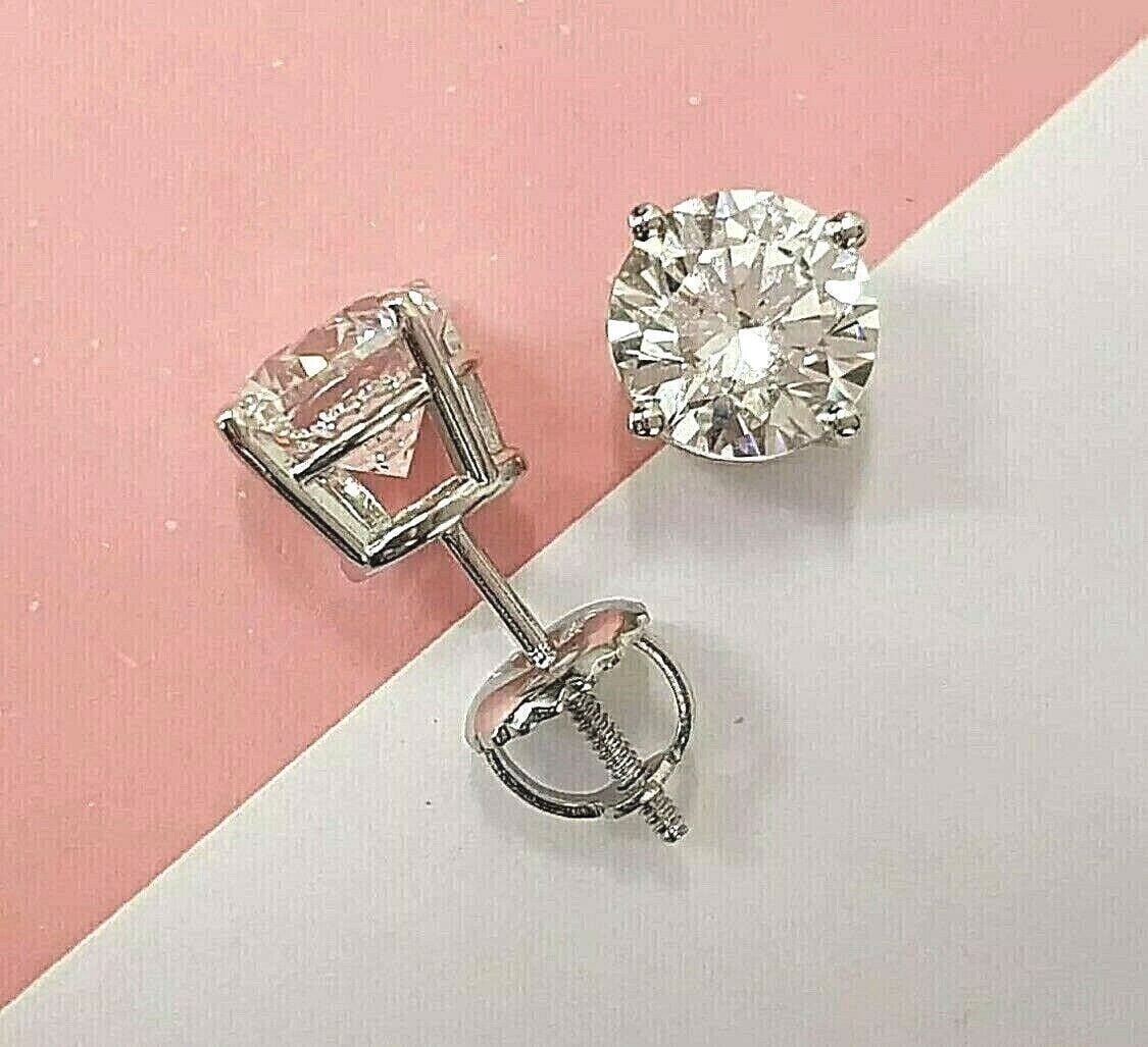 4Ct Oval Cut Lab Created Yellow Diamond Solitaire Stud Earrings 14K White Gold Plated Silver