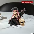 thumbnail image 5 of Rotating acrylic figurine features a gothic fairy with pink and black hair sitting on a skull wearing a fanged crown, 5 of 8