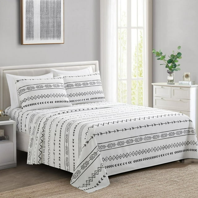 white ultra soft rayon from bamboo sheet set with black simplified modern geometric pattern on bed in bright room