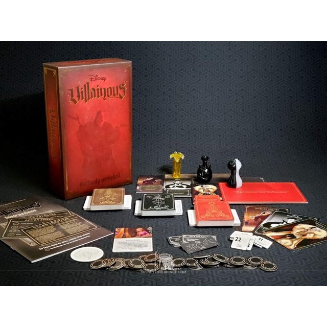 disney villainous: expansión del juego de mesa de estrategia perfectly wretched caja roja vertical a la izquierda con componentes desplegados: tres tableros de villano multicolor, fichas plásticas amarilla, negra y blanca, mazos de cartas ilustradas, monedas circulares y marcadores sobre fondo oscuro; expansión independiente que agrega a Pete, Cruella De Vil y Mother Gothel, a menudo usada para ampliar sesiones de juego de mesa.