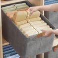 thumbnail image 2 of Organizador de ropa plegable con estructura de acero galvanizado, diseño de transporte, tela gruesa, contenedores de almacenamiento para estantes, armarios y cuartos de servicio, color caqui., 2 of 12