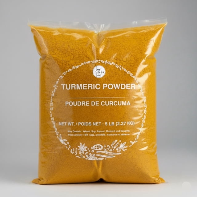 Just Spices - Curcumin Turmeric Powder, (Haldi), 5 lb (2.27 kg) value pack in a clear plastic bag with a vibrant golden-yellow hue. The packaging displays the product name in English and French, along with allergen information. Made from high-quality Indian turmeric roots, this fine and consistent powder is free from additives and preservatives, ideal for curries, spice blends, and beverages.