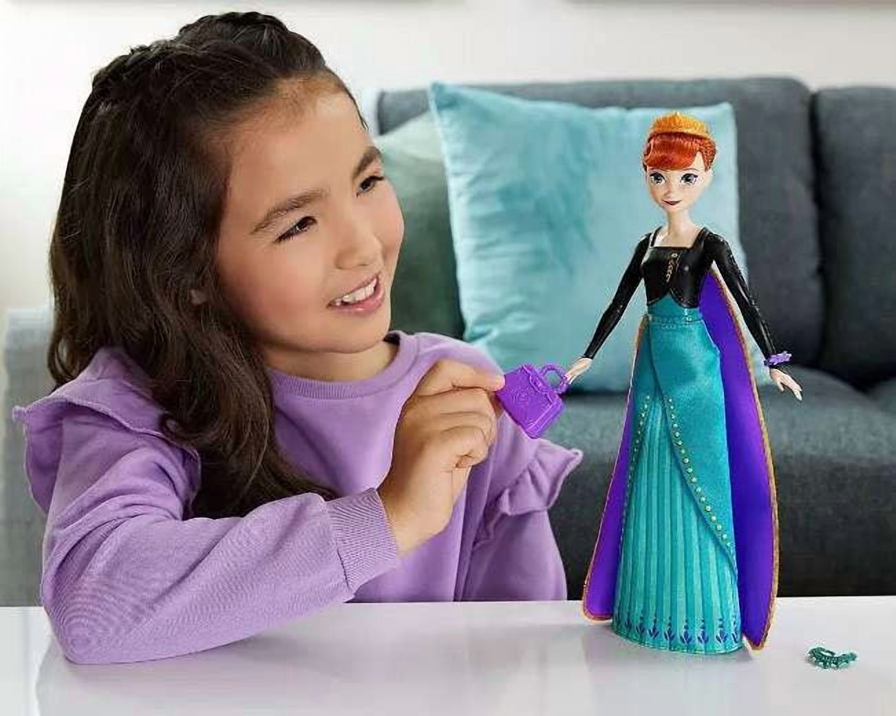 Disney Spin & Reveal Anna Surprise Doll (11 Surprises!)