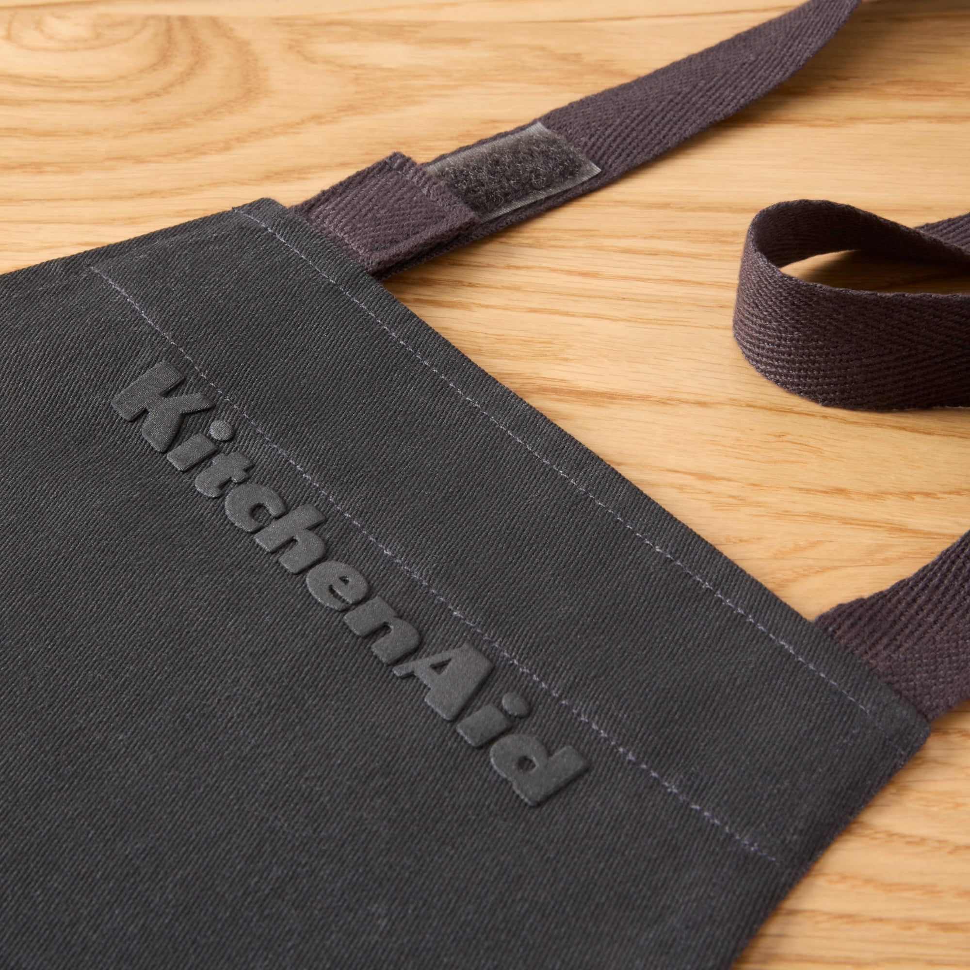 KITCHENAID Gourmet Series Gridlines Little Chef Apron, Water & Stain Resistant, Matte Black, Child-Sized 19"x20"