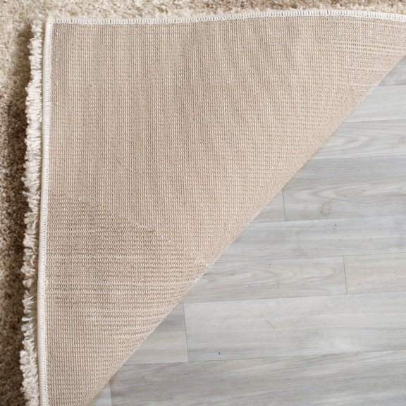SAFAVIEH Portofino Catrine Abstract Shag Area Rug, Ivory/Beige, 6'7" x 9'2"
