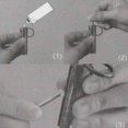 thumbnail image 3 of Llavero TFixol plata & negro, 3 of 7