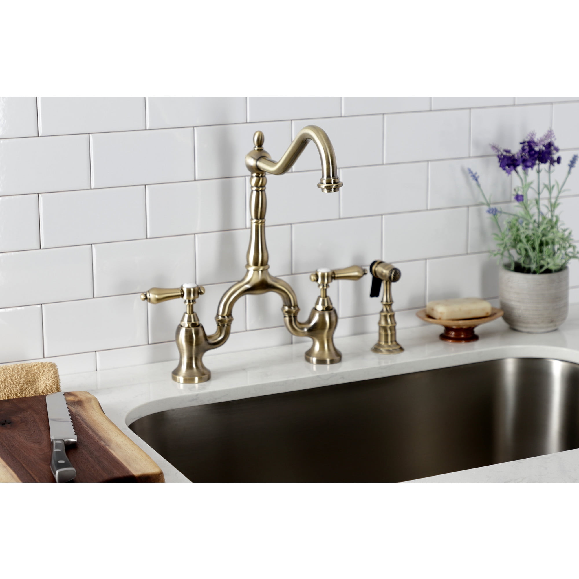 Kingston Brass KS7753BALBS Heirloom Two-Handle 3-Hole Deck Mount Bridge Kitchen Faucet with Brass Side Sprayer in Antique Brass