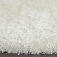 thumbnail image 4 of SAFAVIEH Luxe Paxton Solid Plush Polyester Shag Area Rug, Ivory, 6' x 6' Round, 4 of 9