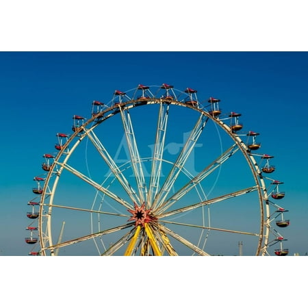 Big Wheel with Multicolored Cabins in Amusement Park Print Wall Art By