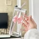 thumbnail image 4 of Vaso de agua de vidrio de 400 ml con tapa y asa, pajita de vidrio desmontable y decoración de mariposa | Vaso transparente duradero para casa, oficina, viajes, té helado y agua, 4 of 7