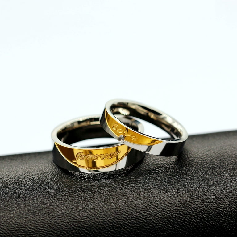 Stainless Steel 6mm Band Ring with Cubic Zirconia Engraved with LOVE Stainless Steel 6mm Band Ring with Cubic Zirconia Engraved with LOVE