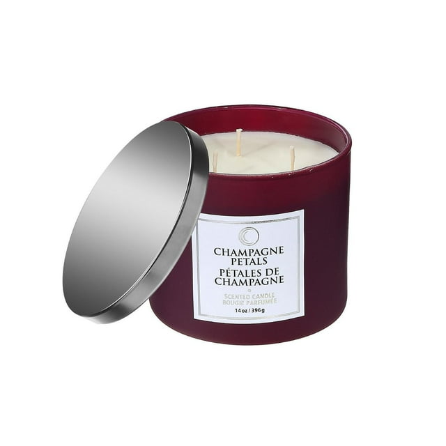 Set of two 14 oz luxe three wick scented candles in burgundy jars with silver lids, labeled Champagne Petals.