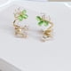 thumbnail image 4 of Pendientes de plata S925 con forma de ojo de gato verde para mujer con tachuelas de circonitas Pendientes de pétalos de flores blancas con temperamento, 4 of 5