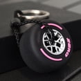 thumbnail image 1 of Llavero con forma de neumático pequeño de goma suave con personalidad y rueda de doble cara, accesorio para llavero con forma de neumático, regalo, 1 of 6