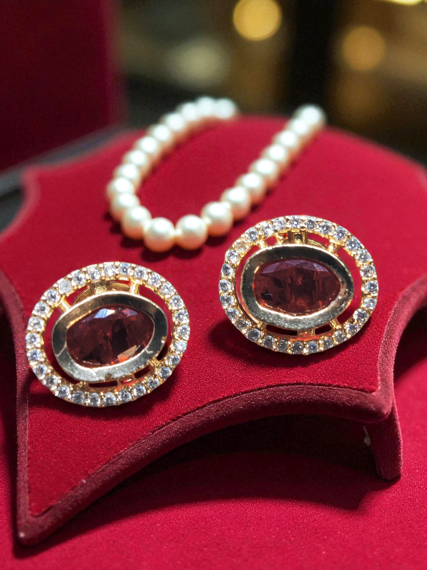 Juhi Jewels Gold Tone Brass Stud Earrings for Women – Red Crystal Gem with Clear Crystal Halo, Anti-Tarnish Fashion Jewelry