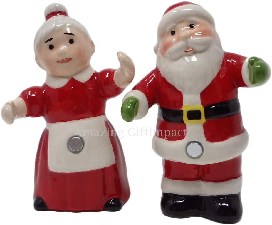 Christmas Santa and Mrs Claus Dancing Couple Hugging Magnetic Salt and Pepper Shakers Set