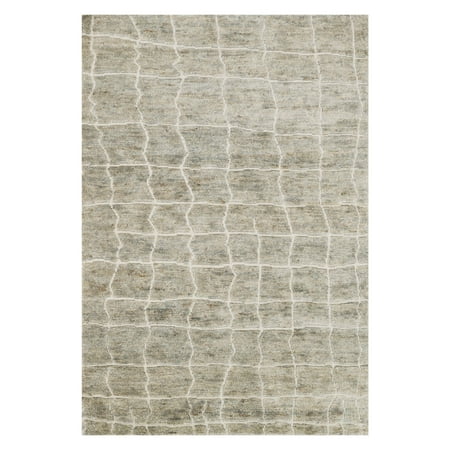 Loloi Sahara SJ-04 Indoor Area Rug The abstract design of the Loloi Sahara SJ-04 Indoor Area Rug brings a stylish statement within any room. Hand-knotted of jute and wool  this fun area rug showcases a natural birch color. Loloi Rugs With a forward-thinking design philosophy  innovative textures  and fresh colors  Loloi Rugs sets the standards for the newest industry trends. Founded in 2004 by Amir Loloi  Loloi Rugs has established itself as an industry pioneer and is committed to designing and hand-crafting the world s most original rugs. Since the company s founding  Loloi has brought its vision to an array of home accents  including pillows and throws. Loloi is proud to have earned the trust and respect of dealers and industry leaders worldwide  winning more awards in the last decade than any other rug company.