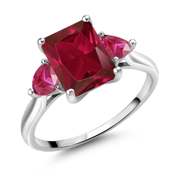 Gem Stone King 10K White Gold Red Created Ruby 3 Stone Engagement Ring for Women (3.34 Cttw, Emerald Cut 9X7MM, Gemstone July Birthstone, Size 5)