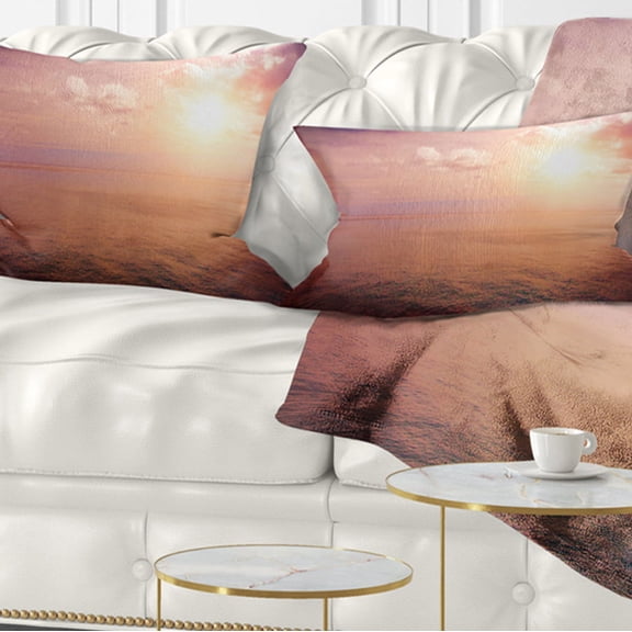 Designart Pink Sky Over Dark Beach at Sunset - Seashore Throw Pillow - 12x20