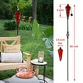 thumbnail image 4 of Westcharm 4 Pack 60 Inch Glass Garden Torch Light with Swirling Metal Ground Pole - Burning Citronella Torch Fuel | Outdoor Lighting for Party Patio Pathway Garden Garden Décor - Green, 4 of 7