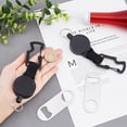 thumbnail image 3 of Abridor de botellas retráctil, 2 llaveros con clip para cinturón, mosquetón multiherramienta y 2 abridores de botellas de acero inoxidable., 3 of 7