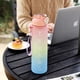 thumbnail image 5 of Botella de agua motivacional para deportes, jarra de agua de 1 l a prueba de fugas sin BPA con pajita y correa de transporte, diseño de boca ancha para una fácil limpieza y colocación de cubitos de, 5 of 5