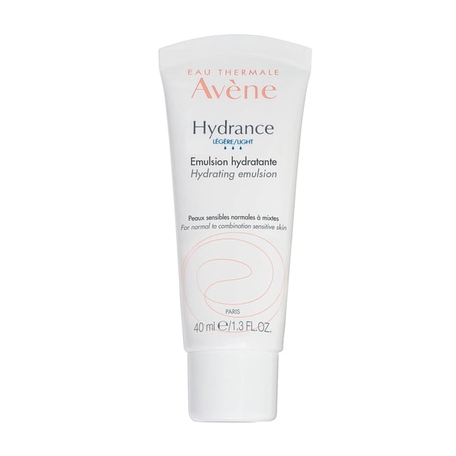 emulsión hidratante ligera avene eau thermale para rostro SPF 20 crema hidratante protectora Avene Hydrance ligera, tubo blanco de 40 ml con texto en azul y naranja, textura ligera no grasa indicada para piel sensible deshidratada y normal a mixta, dimensiones 13 x 4.3 x 3.3 cm; a menudo usada como base ligera en la rutina diaria.