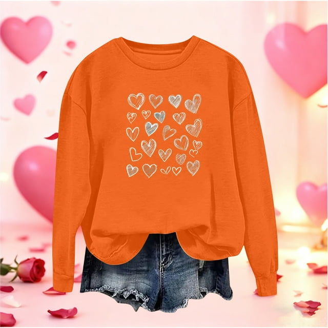 Mceream Chandails de la Saint-Valentin pour Femmes Mode Décontractée Imprimé Cœur Graphique Manches Longues Chemises Surdimensionnées Col Rond Chandail Hauts Grande Taille Orange TTG