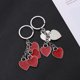 thumbnail image 2 of 2 llaveros de corazón creativos con colgante de cuatro corazones de amor, llavero de aleación de zinc, adornos artesanales para decoración de bolsos y llaves de coche., 2 of 6