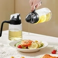 thumbnail image 5 of QTOCIO Olive Oil Dispenser Bottle Leakproof Glass Oil Container with Non-Slip Handle Automatic Cap And Stopper Oil Dispenser Bottle for Kitchen 300ML, 5 of 6