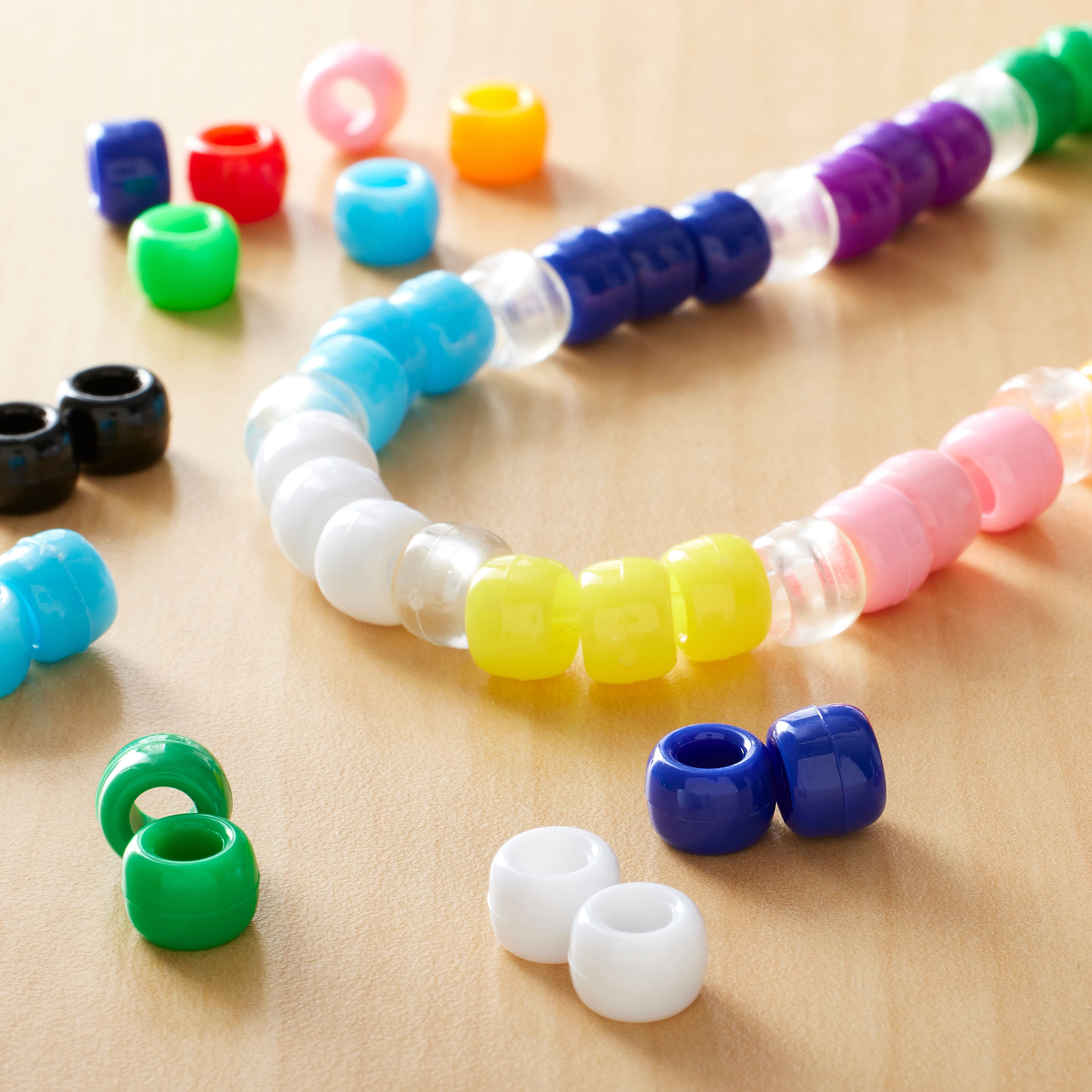 12 Packs: 580 ct. (6,960 total) Multicolor Opaque Pony Beads by Creatology - 6mm x 9mm