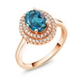 thumbnail image 2 of Gem Stone King 18K Rose Gold Plated Silver Oval London Blue Topaz Halo Engagement Ring for Women (2.70 Cttw, Gemstone November Birthstone, Oval 8X6MM, Size 6), 2 of 4