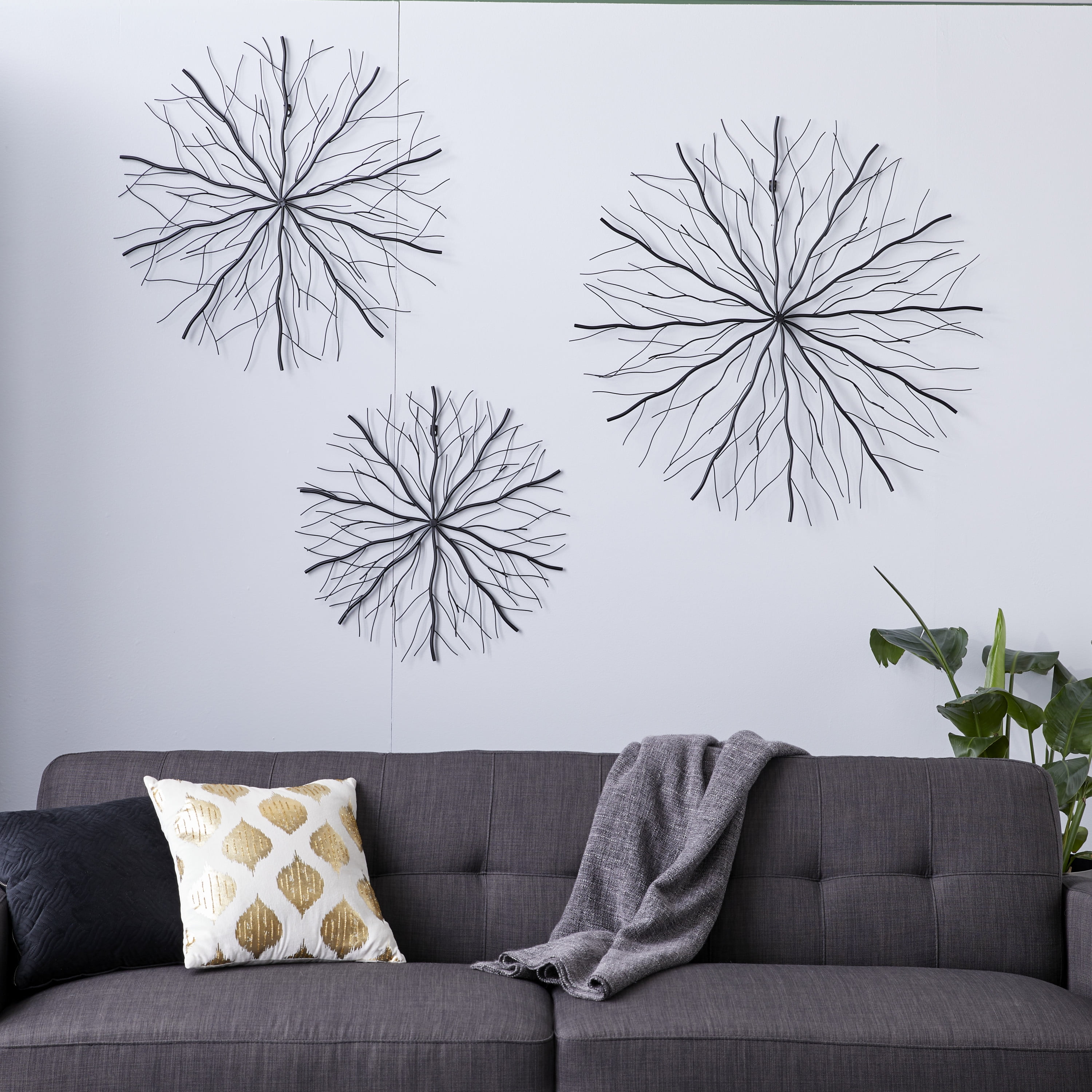 DecMode Black Metal Starburst Wall Decor with Branch Inspired Design (3