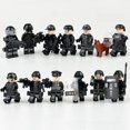 thumbnail image 2 of Muñeca de policía especial negra, bloques de construcción pequeños, juguete, accesorios dorados, arma, perro, escudo, máscara, 2 of 2