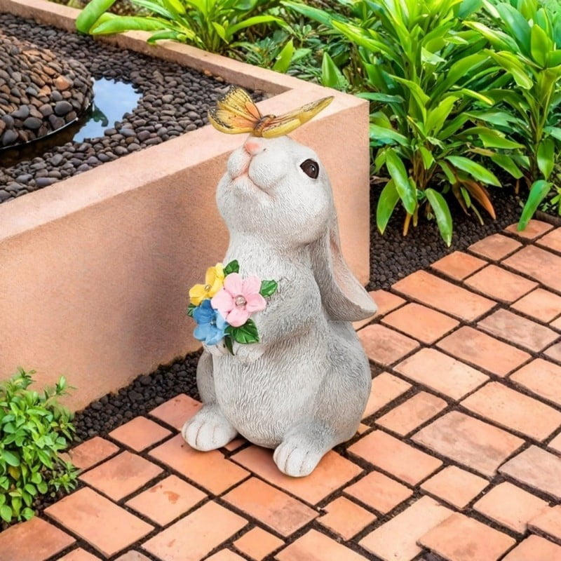 1pc solar-powered outdoor decorative rabbit statue with butterfly lights, adding the perfect touch to garden decor