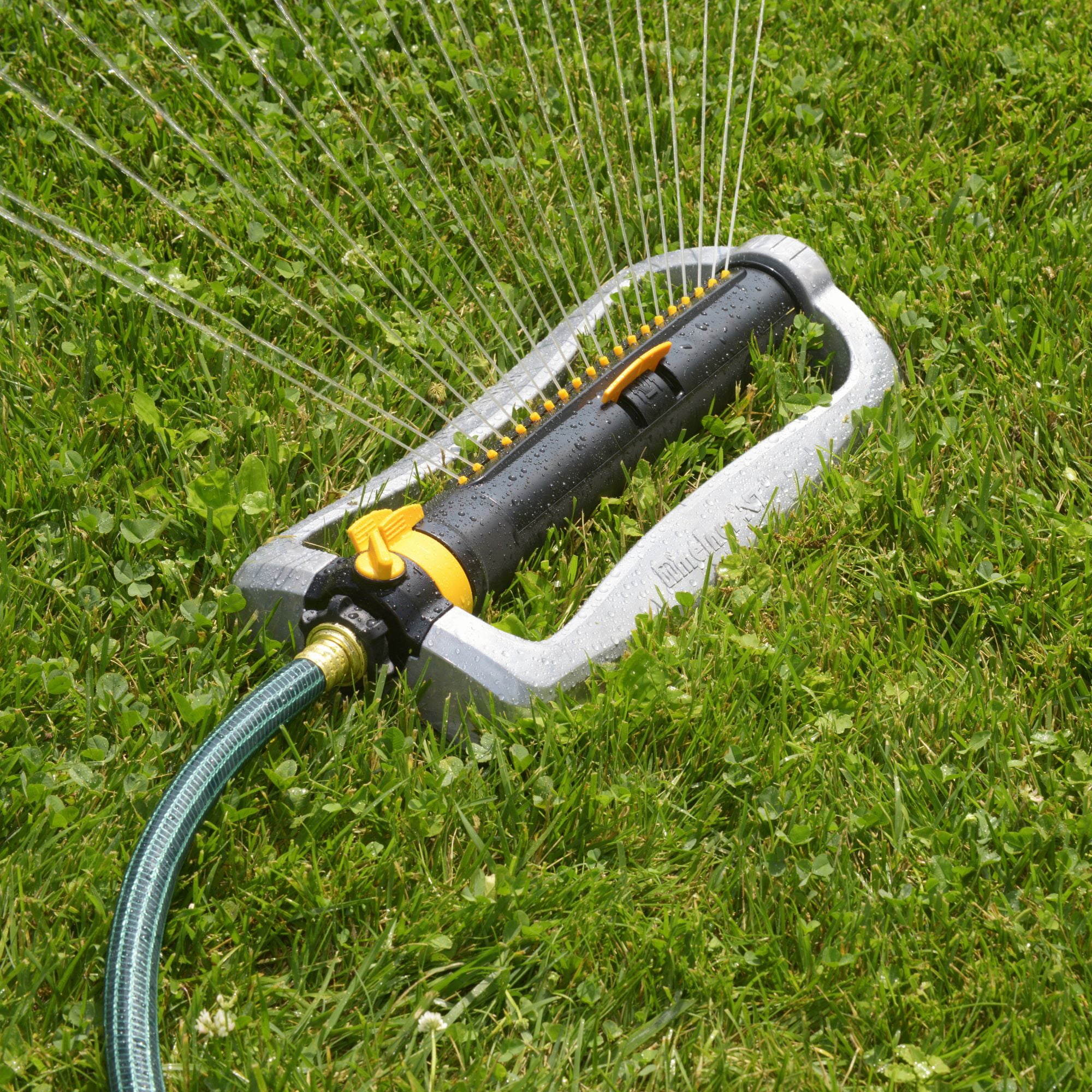 Melnor XT45200M Metal Turbo Oscillating Sprinkler with Flow Control, 4,500 sq. ft., Adjustable Width and Range, Dirt-Resistant Drive - Black, Orange