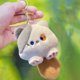 thumbnail image 1 of Adorable gatito chirriante de peluche para colgar en el llavero de la máquina, 1 of 5