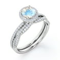 thumbnail image 4 of JeenMata Four-Prong Halo Setting 1.75 Carat Round Brilliant Cut Blue Moonstone and Moissanite Pave Infinity Bridal Ring Set in 18K White Gold Plating over Silver, 4 of 6