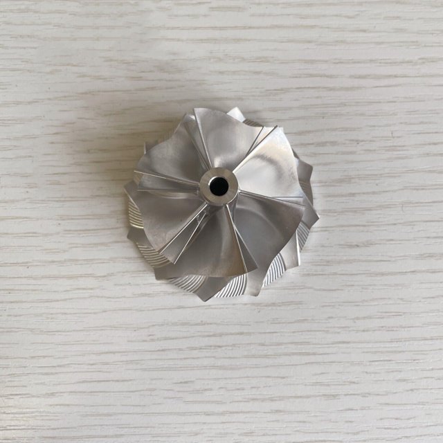 Impulsores TD04HL 7+7 de 44,00/62,00 mm de rendimiento para rueda de compresor de palanquilla de turbina MAN ce 40-