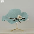 thumbnail image 2 of Sombrero Para Playa De Niña Ondulado Tejido De Paja Con Flor azul, 2 of 7