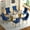 Table with 6 Blue Chairs Golden Leg, variant on Sumdeal 63" Modern Sintered Stone Dining Table with 6 Velvet Dining Chairs,White pattened Table with Silver Leg,6 Black Chairs