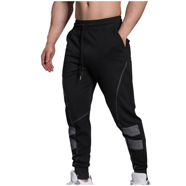 Pantalones largos de moda para hombre, casuales, de color sólido, con cintura elástica y bolsillos, con pernera ajustada, pantalones largos de poliéster y algodón para hombre.